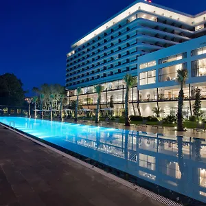 Ramada Plaza & Отель